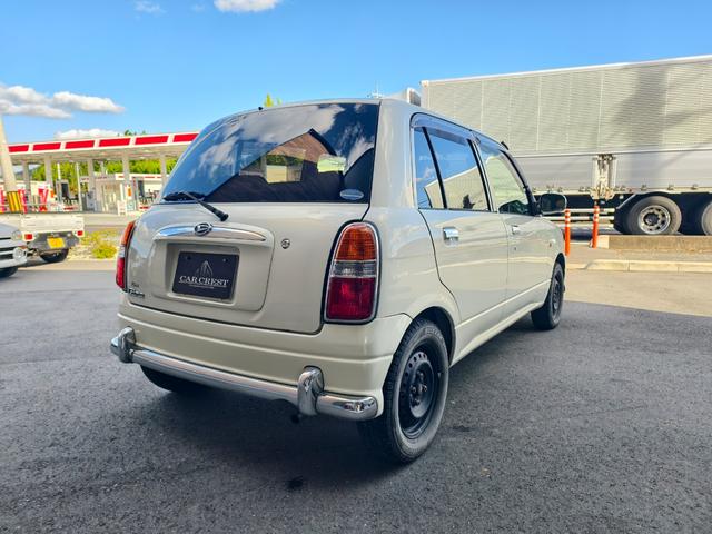 ミラジーノ ジーノ　タイミングベルト交換済み　ＥＴＣ　助手席エアバック　ＡＣ　エアーバッグ　ＰＷ　キーレス　パワステ　衝突安全ボディ　ウッド内装　レザーシート（8枚目）