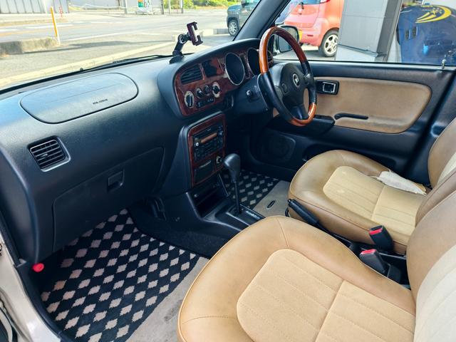 ミラジーノ ジーノ　タイミングベルト交換済み　ＥＴＣ　助手席エアバック　ＡＣ　エアーバッグ　ＰＷ　キーレス　パワステ　衝突安全ボディ　ウッド内装　レザーシート（12枚目）