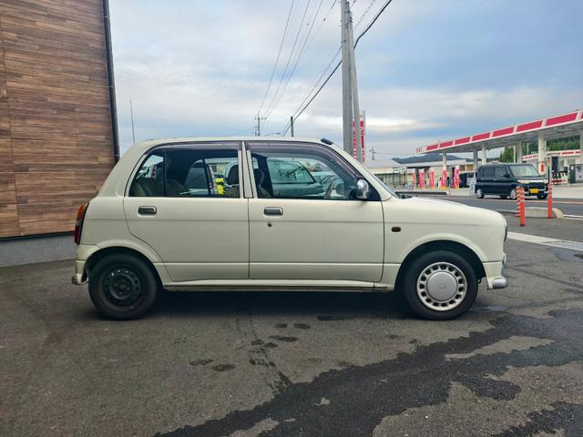 ミラジーノ ジーノ　メモリアルエディション　タイミングベルト交換済み　ウッド内装　パワーウインドウ　運転席エアバッグ　エアコン　パワステ　衝突安全ボディ　助手席エアバッグ（4枚目）