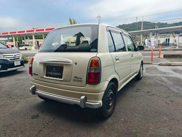 ミラジーノ ジーノ　メモリアルエディション　タイミングベルト交換済み　ウッド内装　パワーウインドウ　運転席エアバッグ　エアコン　パワステ　衝突安全ボディ　助手席エアバッグ（8枚目）