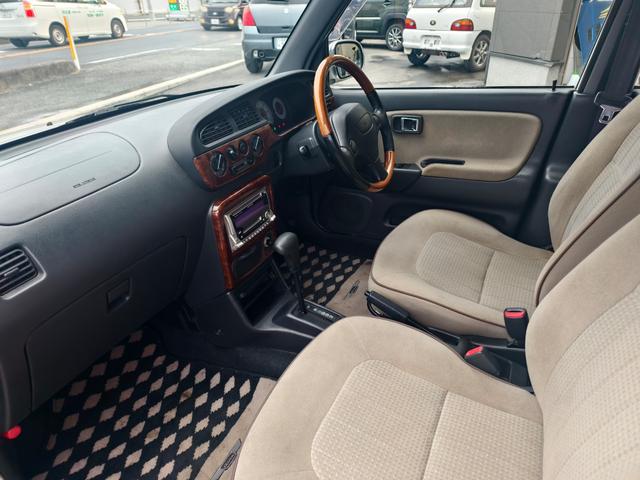 ミラジーノ ジーノ　メモリアルエディション　タイミングベルト交換済み　ウッド内装　パワーウインドウ　運転席エアバッグ　エアコン　パワステ　衝突安全ボディ　助手席エアバッグ（12枚目）