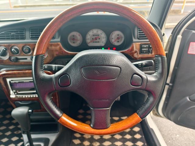ミラジーノ ジーノ　メモリアルエディション　タイミングベルト交換済み　ウッド内装　パワーウインドウ　運転席エアバッグ　エアコン　パワステ　衝突安全ボディ　助手席エアバッグ（22枚目）