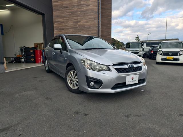 インプレッサG4 1.6i-L イモビライザー キーレスエントリー オートエアコン ナビ メモリーナビ フルタイム4WD パワーステアリング ABS 運転席エアバッグ パワーウィンドウ 電動格納ドアミラー(3枚目)