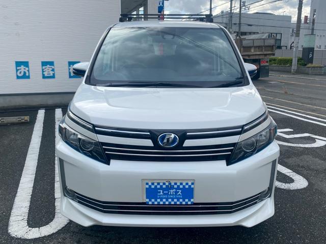 ヴォクシー ハイブリッドＶ　純正９インチナビ／ＴＶ／Ｂｌｕｅｔｏｏｔｈ／バックカメラ／両側パワースライドドア／フリップダウンモニター／純正アルミ／クルーズコントロール／ＥＴＣ／シートヒーター／セーフティーセンス（2枚目）