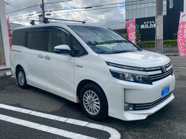 ヴォクシー ハイブリッドＶ　純正９インチナビ／ＴＶ／Ｂｌｕｅｔｏｏｔｈ／バックカメラ／両側パワースライドドア／フリップダウンモニター／純正アルミ／クルーズコントロール／ＥＴＣ／シートヒーター／セーフティーセンス（5枚目）