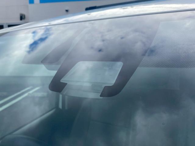 ヴォクシー ハイブリッドＶ　純正９インチナビ／ＴＶ／Ｂｌｕｅｔｏｏｔｈ／バックカメラ／両側パワースライドドア／フリップダウンモニター／純正アルミ／クルーズコントロール／ＥＴＣ／シートヒーター／セーフティーセンス（21枚目）