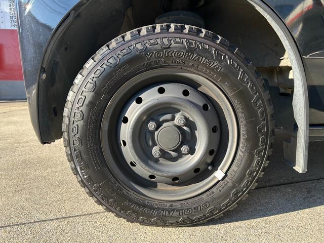 ミニキャブバン ブラボー　ＣＤオーディオ　キーレス　スペアキー　ＥＴＣ　４ＡＴ　電格ミラー　パワーウィンドウ　エアコン　アームレスト　オールテレーンタイヤ　シガーソケット　ヘッドライトレベライザー　車検整備付き（54枚目）