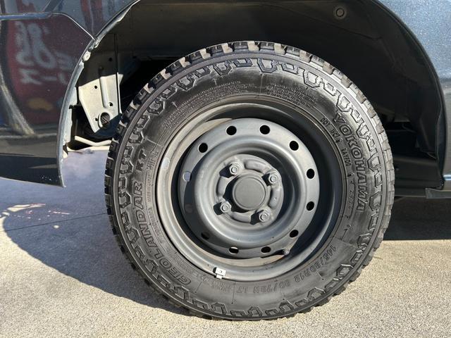 ミニキャブバン ブラボー　ＣＤオーディオ　キーレス　スペアキー　ＥＴＣ　４ＡＴ　電格ミラー　パワーウィンドウ　エアコン　アームレスト　オールテレーンタイヤ　シガーソケット　ヘッドライトレベライザー　車検整備付き（56枚目）