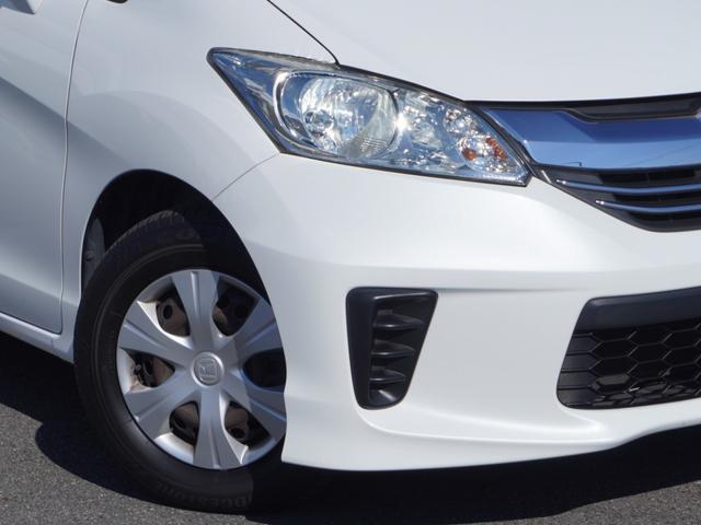 フリード Ｇジャストセレクション　ワンオーナー　ナビ　バックカメラ　ＥＴＣ　６人乗り　片側電動スライドドア　Ｂｌｕｅｔｏｏｔｈ　フルセグＴＶ　ミュージックラック　ＤＶＤ　ＨＩＤヘッドライト　スマートキー　横滑り防止装置　ドアバイザー（10枚目）