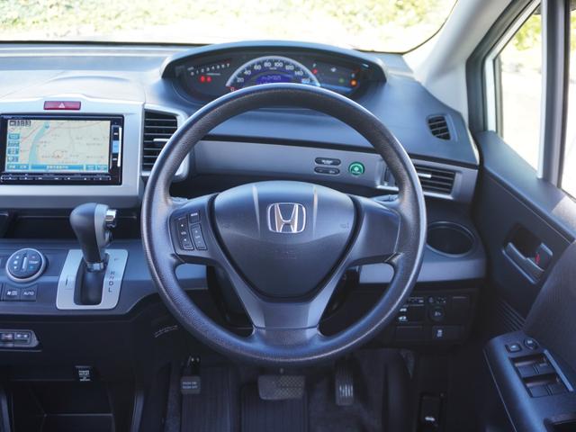 フリード Ｇジャストセレクション　ワンオーナー　ナビ　バックカメラ　ＥＴＣ　６人乗り　片側電動スライドドア　Ｂｌｕｅｔｏｏｔｈ　フルセグＴＶ　ミュージックラック　ＤＶＤ　ＨＩＤヘッドライト　スマートキー　横滑り防止装置　ドアバイザー（36枚目）