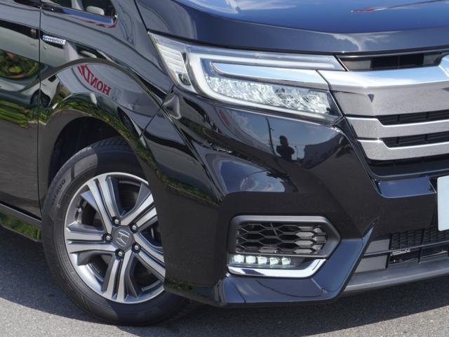 ステップワゴンスパーダ スパーダハイブリッドG・EXホンダセンシング ワンオーナー 9inインターナビ ドラレコ バックカメラ ETC シートヒーター 両側電動スライドドア アダプティブクルーズコントロール フルセグTV Bluetooth 16インチ純正アルミホイール(12枚目)
