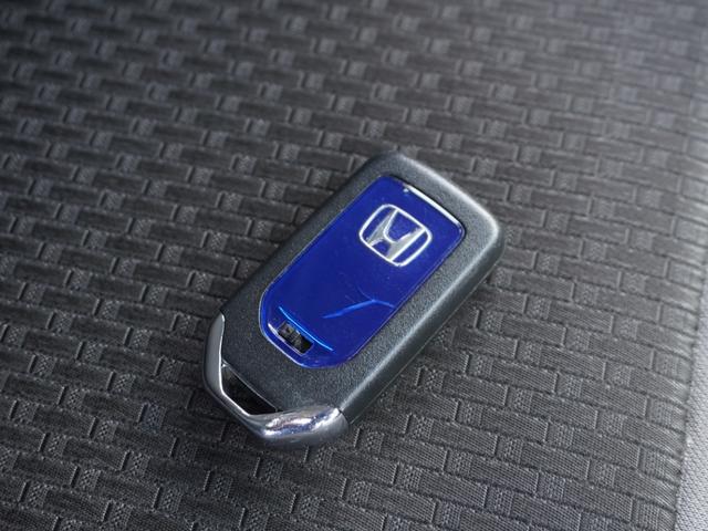 ステップワゴンスパーダ スパーダハイブリッドG・EXホンダセンシング ワンオーナー 9inインターナビ ドラレコ バックカメラ ETC シートヒーター 両側電動スライドドア アダプティブクルーズコントロール フルセグTV Bluetooth 16インチ純正アルミホイール(26枚目)