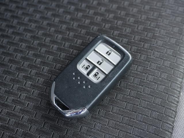 ステップワゴンスパーダ スパーダハイブリッドG・EXホンダセンシング ワンオーナー 9inインターナビ ドラレコ バックカメラ ETC シートヒーター 両側電動スライドドア アダプティブクルーズコントロール フルセグTV Bluetooth 16インチ純正アルミホイール(27枚目)