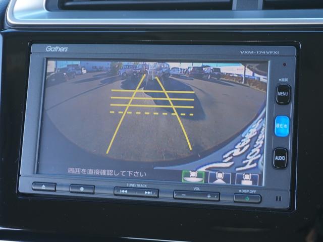 フィットハイブリッド Ｌパッケージ　ワンオーナー　禁煙車　衝突被害軽減ブレーキ　ホンダ純正ナビ　バックカメラ　ＥＴＣ　クルーズコントロール　フルセグＴＶ　スマートキー　プッシュスタート　ＬＥＤヘッドライト　横滑り防止装置　定期点検記録簿（6枚目）