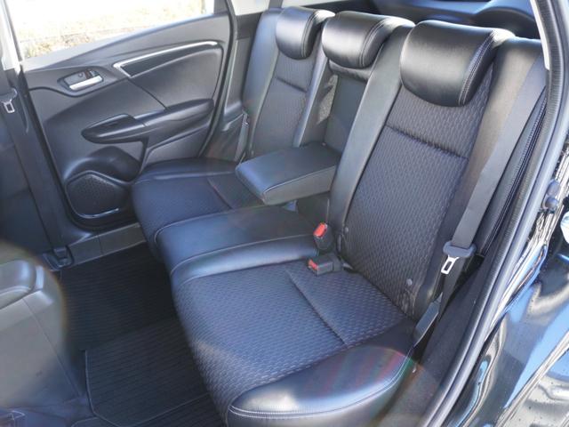 フィットハイブリッド Ｌパッケージ　ワンオーナー　禁煙車　衝突被害軽減ブレーキ　ホンダ純正ナビ　バックカメラ　ＥＴＣ　クルーズコントロール　フルセグＴＶ　スマートキー　プッシュスタート　ＬＥＤヘッドライト　横滑り防止装置　定期点検記録簿（28枚目）