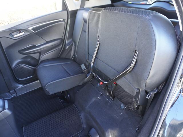 フィットハイブリッド Ｌパッケージ　ワンオーナー　禁煙車　衝突被害軽減ブレーキ　ホンダ純正ナビ　バックカメラ　ＥＴＣ　クルーズコントロール　フルセグＴＶ　スマートキー　プッシュスタート　ＬＥＤヘッドライト　横滑り防止装置　定期点検記録簿（29枚目）