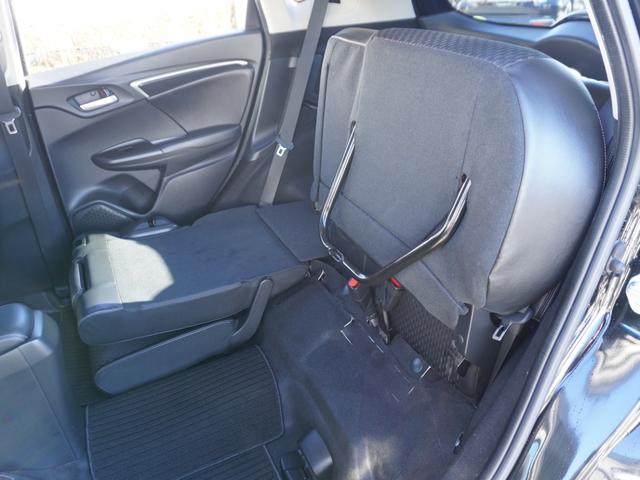 フィットハイブリッド Ｌパッケージ　ワンオーナー　禁煙車　衝突被害軽減ブレーキ　ホンダ純正ナビ　バックカメラ　ＥＴＣ　クルーズコントロール　フルセグＴＶ　スマートキー　プッシュスタート　ＬＥＤヘッドライト　横滑り防止装置　定期点検記録簿（30枚目）