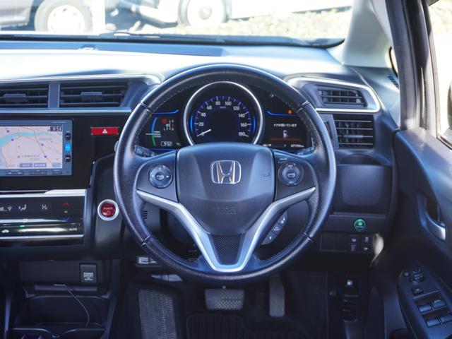 フィットハイブリッド Ｌパッケージ　ワンオーナー　禁煙車　衝突被害軽減ブレーキ　ホンダ純正ナビ　バックカメラ　ＥＴＣ　クルーズコントロール　フルセグＴＶ　スマートキー　プッシュスタート　ＬＥＤヘッドライト　横滑り防止装置　定期点検記録簿（40枚目）