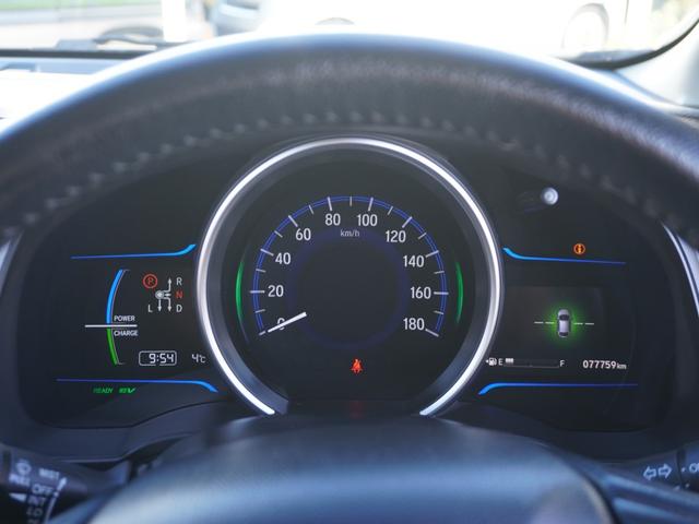 フィットハイブリッド Ｌパッケージ　ワンオーナー　禁煙車　衝突被害軽減ブレーキ　ホンダ純正ナビ　バックカメラ　ＥＴＣ　クルーズコントロール　フルセグＴＶ　スマートキー　プッシュスタート　ＬＥＤヘッドライト　横滑り防止装置　定期点検記録簿（51枚目）