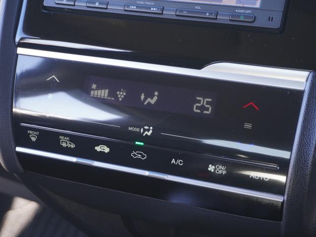 フィットハイブリッド Ｌパッケージ　ワンオーナー　禁煙車　衝突被害軽減ブレーキ　ホンダ純正ナビ　バックカメラ　ＥＴＣ　クルーズコントロール　フルセグＴＶ　スマートキー　プッシュスタート　ＬＥＤヘッドライト　横滑り防止装置　定期点検記録簿（56枚目）