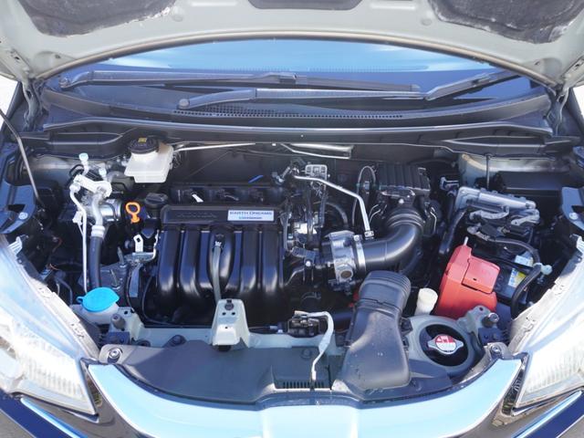フィットハイブリッド Ｌパッケージ　ワンオーナー　禁煙車　衝突被害軽減ブレーキ　ホンダ純正ナビ　バックカメラ　ＥＴＣ　クルーズコントロール　フルセグＴＶ　スマートキー　プッシュスタート　ＬＥＤヘッドライト　横滑り防止装置　定期点検記録簿（70枚目）