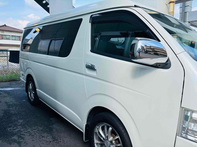 ハイエースワゴン GL 4WD ベッドキット バックカメラ TV オートクルーズコントロール 電動スライドドア オートライト スマートキー 電動格納ミラー 後席モニター 3列シート AT ユーザー買取(14枚目)