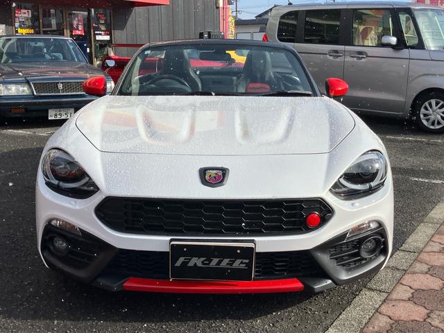 アバルト124 スパイダー ベースグレード 社外マフラー 社外足回り ナビ TV DVD再生 バックカメラ 6速MT シートヒーター 17インチアルミ クルーズコントロール ETC(2枚目)