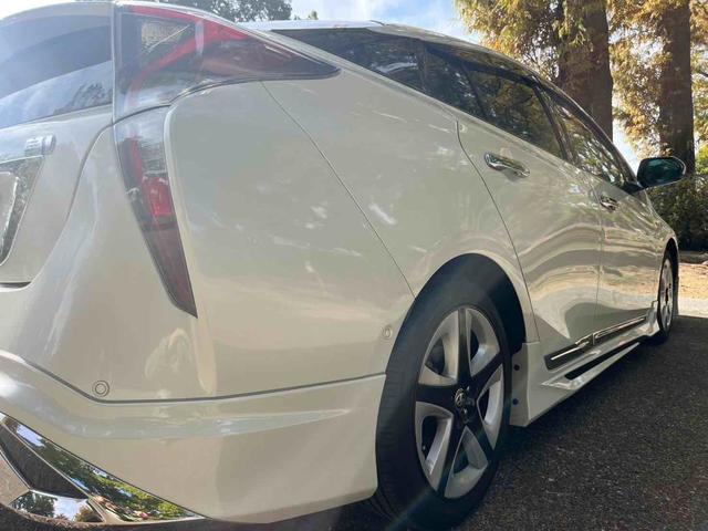 プリウス Ａ　評価点４．５点　モデリスタフルエアロ　９インチＴＶ　ツーリング１７インチアルミ　禁煙車　オートクルーズコントロール　バックカメラ　ＴＶ　アルミホイール　ＬＥＤヘッドランプ　ＣＶＴ　スマートキー（24枚目）