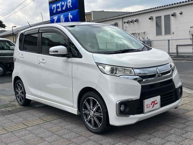 eKカスタム Tセーフティパッケージ ターボ バックカメラ メモリー地デジナビ 衝突被害軽減システム オートマチックハイビーム オートライト HID スマートキー アイドリングストップ 電動格納ミラー シートヒーター(13枚目)