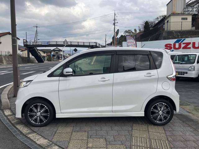 eKカスタム Tセーフティパッケージ ターボ バックカメラ メモリー地デジナビ 衝突被害軽減システム オートマチックハイビーム オートライト HID スマートキー アイドリングストップ 電動格納ミラー シートヒーター(15枚目)