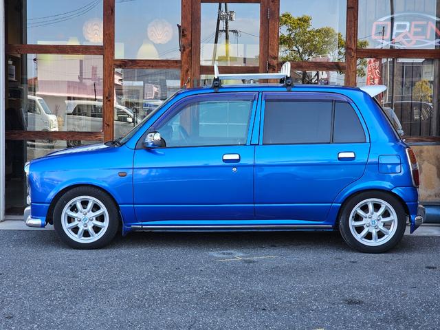 ミラジーノ ミニライトスペシャルターボ　全席取り外し清掃済　ターボ　車高調　社外マフラー　ミニライトホイール　ルーフキャリア　リアスポイラー　ＬＥＤテール　社外ナビ　地デジ　Ｂｌｕｅｔｏｏｔｈ　社外シートカバー　後期グリル　２眼メーター（7枚目）