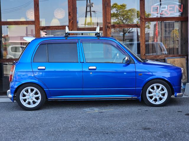 ミラジーノ ミニライトスペシャルターボ　全席取り外し清掃済　ターボ　車高調　社外マフラー　ミニライトホイール　ルーフキャリア　リアスポイラー　ＬＥＤテール　社外ナビ　地デジ　Ｂｌｕｅｔｏｏｔｈ　社外シートカバー　後期グリル　２眼メーター（8枚目）