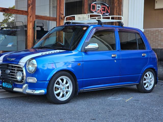 ミラジーノ ミニライトスペシャルターボ　全席取り外し清掃済　ターボ　車高調　社外マフラー　ミニライトホイール　ルーフキャリア　リアスポイラー　ＬＥＤテール　社外ナビ　地デジ　Ｂｌｕｅｔｏｏｔｈ　社外シートカバー　後期グリル　２眼メーター（12枚目）