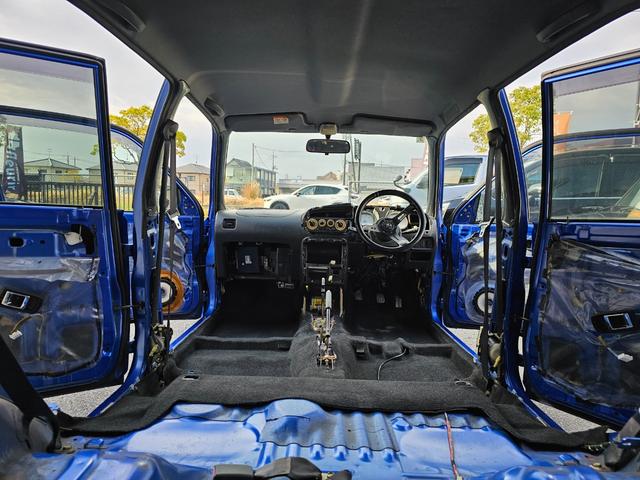 ミラジーノ ミニライトスペシャルターボ 全席取り外し清掃済 ターボ 5MT ローダウン D-SPORTSショック 社外エアクリ オーバーフェンダー メッシュグリル センターマフラー 社外フロントパイプ ショートシフト MOMOステアリング(3枚目)