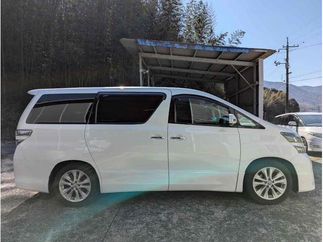 ヴェルファイア ２．４Ｚ　プラチナムセレクション　バックカメラ　ＴＶ　クリアランスソナー　両側電動スライドドア　オートライト　ＨＩＤ　電動リアゲート　スマートキー　電動格納ミラー　後席モニター　３列シート　オットマン　ＣＶＴ　アルミホイール　ＵＳＢ（14枚目）