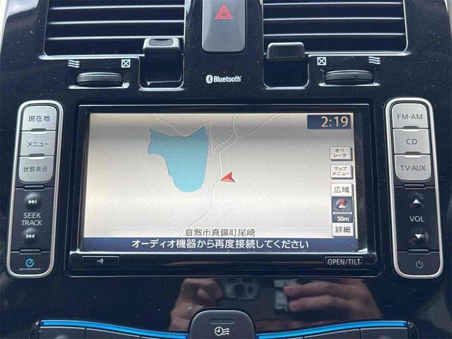 リーフ Ｇ　バックカメラ　ナビ　ＴＶ　オートクルーズコントロール　アルミホイール　スマートキー　電動格納ミラー　シートヒーター　ＣＶＴ　盗難防止システム　衝突安全ボディ　記録簿　ＡＢＳ　ＥＳＣ　ＣＤ（4枚目）