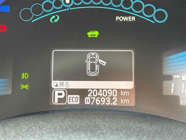 リーフ Ｇ　バックカメラ　ナビ　ＴＶ　オートクルーズコントロール　アルミホイール　スマートキー　電動格納ミラー　シートヒーター　ＣＶＴ　盗難防止システム　衝突安全ボディ　記録簿　ＡＢＳ　ＥＳＣ　ＣＤ（25枚目）