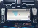 リーフ Ｇ　バックカメラ　ナビ　ＴＶ　オートクルーズコントロール　アルミホイール　スマートキー　電動格納ミラー　シートヒーター　ＣＶＴ　盗難防止システム　衝突安全ボディ　記録簿　ＡＢＳ　ＥＳＣ　ＣＤ（4枚目）