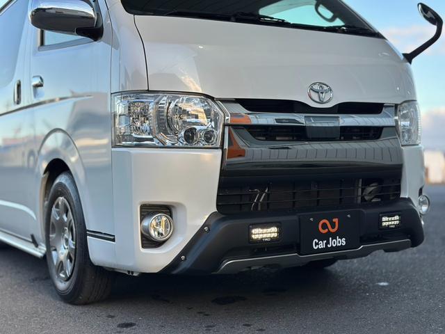 ハイエースバン スーパーＧＬ　５０ＴＨ　アニバーサリーリミテッド　ガソリンモデル　寒冷地仕様　リヤフォグランプ　ＴＲＤフルエアロ　パワースライドドア　フローティングナビ　ＴＶ　バックカメラ　ＥＴＣ　スマートキー　トヨタセーフティセンス　リヤコーナーセンサー　禁煙車（13枚目）