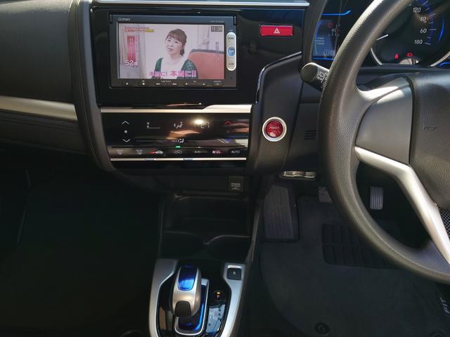 フィットハイブリッド Ｆパッケージ　Ｇａｔｈｅｒｓナビ・（地デジ・ＤＶＤ・ＣＤ・ＳＤ）・バックカメラ・ＥＴＣ・マルチインフォメーションディスプレイ・オートエアコン・スマートキーＸ２・（16枚目）