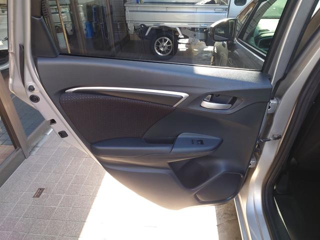 フィットハイブリッド Ｆパッケージ　Ｇａｔｈｅｒｓナビ・（地デジ・ＤＶＤ・ＣＤ・ＳＤ）・バックカメラ・ＥＴＣ・マルチインフォメーションディスプレイ・オートエアコン・スマートキーＸ２・（26枚目）