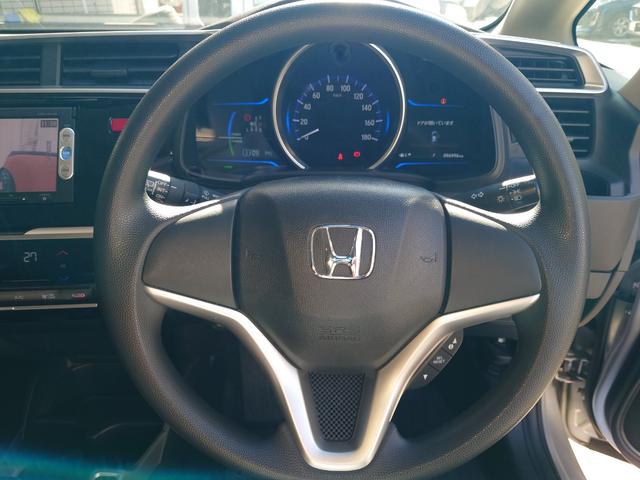 フィットハイブリッド Ｆパッケージ　Ｇａｔｈｅｒｓナビ・（地デジ・ＤＶＤ・ＣＤ・ＳＤ）・バックカメラ・ＥＴＣ・マルチインフォメーションディスプレイ・オートエアコン・スマートキーＸ２・（29枚目）