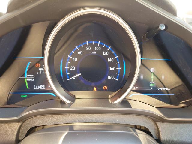 フィットハイブリッド Ｆパッケージ　Ｇａｔｈｅｒｓナビ・（地デジ・ＤＶＤ・ＣＤ・ＳＤ）・バックカメラ・ＥＴＣ・マルチインフォメーションディスプレイ・オートエアコン・スマートキーＸ２・（30枚目）