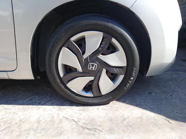 フィットハイブリッド Ｆパッケージ　Ｇａｔｈｅｒｓナビ・（地デジ・ＤＶＤ・ＣＤ・ＳＤ）・バックカメラ・ＥＴＣ・マルチインフォメーションディスプレイ・オートエアコン・スマートキーＸ２・（36枚目）