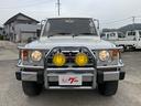 ワイド　スーパーエクシード　７人乗り　４ＷＤ　サンルーフ　Ｖ６エンジン　ＥＴＣ　シートヒーター　ＡＷ１５インチ　純正ＬＳＤ　純正ハードサスペンション　純正リアスポイラー　純正グリルガード　純正フォグランプ（31枚目）