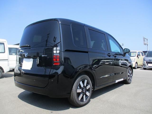 フリード ｅ：ＨＥＶエアー　ＥＸ　ソナー　クルーズコントロール　横滑り防止　衝突被害軽減装置　レーンアシスト　サイドカーテンエアバック　ＬＥＤヘッドランプ　アイドリングストップ　スマートキー　リアクーラー　キーレス　シートヒーター（9枚目）