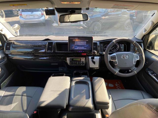 ハイエースワゴン グランドキャビン 10人乗り ワンオーナー 走行1500キロ 4WD アルパイン11型ナビTV 連動ドライブレコーダー ETC Bカメラ 社外アルミ 社外テール 社外サイドオーニング クリアランスソナー 黒シートカバー 左電動スライドドア スマートキー 買取直売(2枚目)