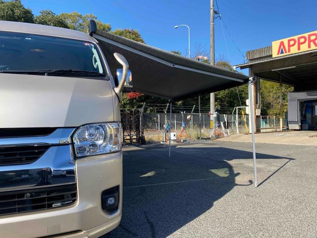 ハイエースワゴン グランドキャビン 10人乗り ワンオーナー 走行1500キロ 4WD アルパイン11型ナビTV 連動ドライブレコーダー ETC Bカメラ 社外アルミ 社外テール 社外サイドオーニング クリアランスソナー 黒シートカバー 左電動スライドドア スマートキー 買取直売(30枚目)
