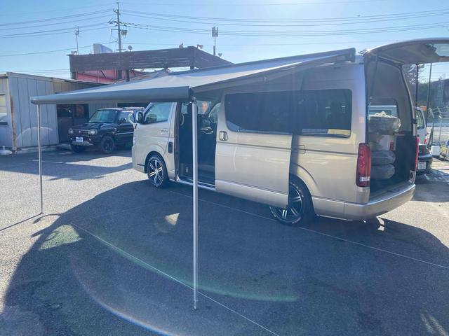 ハイエースワゴン グランドキャビン 10人乗り ワンオーナー 走行1500キロ 4WD アルパイン11型ナビTV 連動ドライブレコーダー ETC Bカメラ 社外アルミ 社外テール 社外サイドオーニング クリアランスソナー 黒シートカバー 左電動スライドドア スマートキー 買取直売(34枚目)