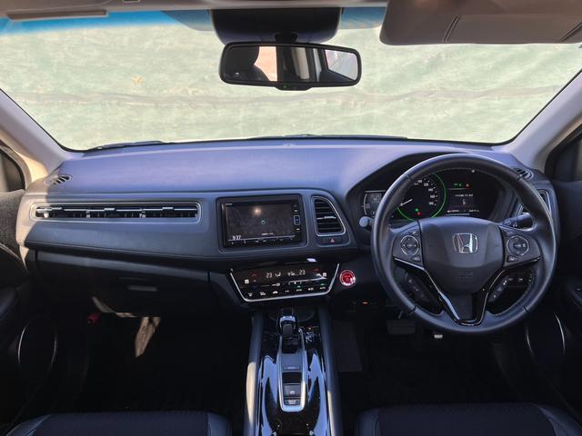 ヴェゼル ハイブリッドＺ・ホンダセンシング　ワンオーナー　禁煙車　純正ナビ　フルセグＴＶ　Ｂｌｕｅｔｏｏｔｈ接続　ＣＤ＆ＤＶＤ　ハーフレザー　バックカメラ　ビルトインＥＴＣ　クルーズコントロール　ＬＥＤヘッドライト　前席シートヒーター（3枚目）